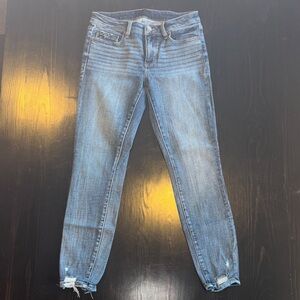 Buckle Women's Faded Blue Skinny Jeans with Raw Hem